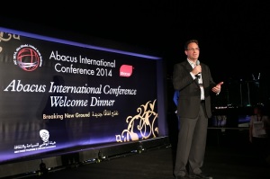 Robert Bailey, president and CEO of Abacus, welcomes the media during the Abacus International Conference 2014 in Abu Dhabi. Photo courtesy of Abacus